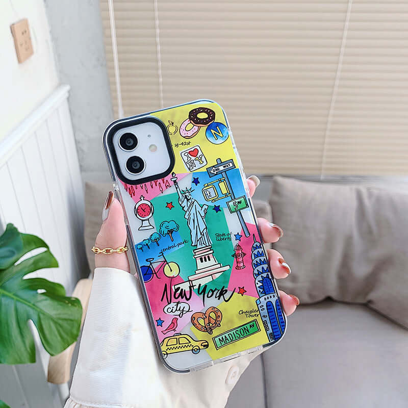 Fashion travel label iPhone 12 case featuring vibrant New York City travel prints and landmarks.