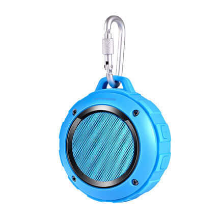 Waterproof Bluetooth speaker with carabiner attachment and rugged blue design.