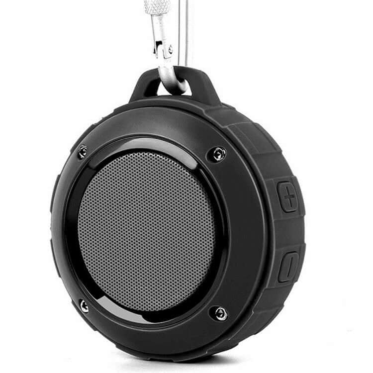 Waterproof Bluetooth speaker designed for outdoor use with durable shell and Bluetooth connectivity.