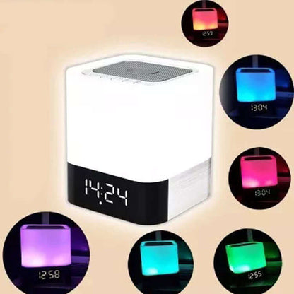 Bluetooth Speaker with LED night light, clock display, and Bluetooth connectivity for audio streaming.