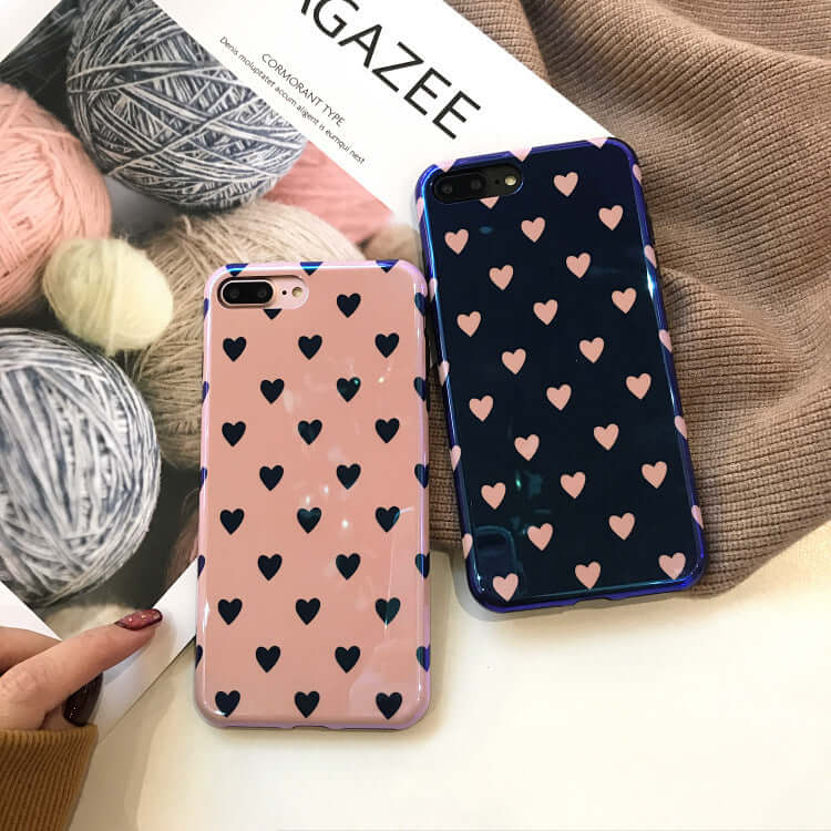 Image of blu-ray love heart phone case designs featuring pink and navy backgrounds with heart patterns.