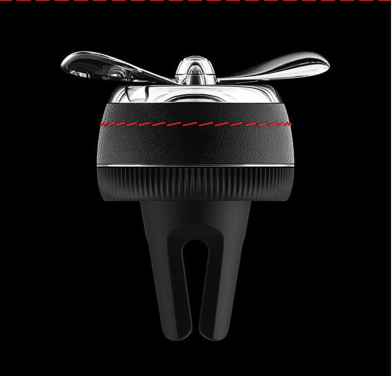 Car sesame oil diffuser clip-on air vent decoration in silver, black, and red colors.