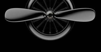Car sesame oil diffuser shaped like a round wheel with sleek black design for car air vent decoration