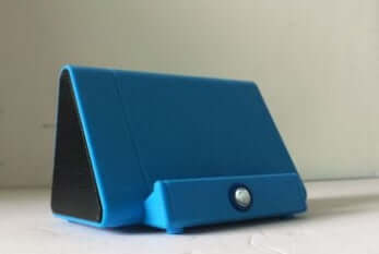 Smart Bluetooth Speaker in vibrant blue color showcasing a sleek design and compact size.