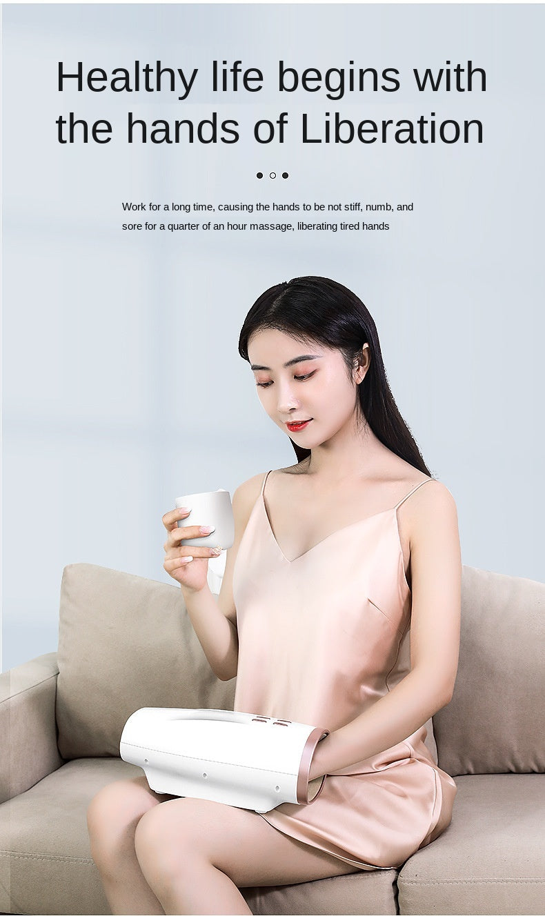 A woman relaxing with a Mechanical Smart Tapping Hand Wireless Hand Massager while enjoying a cup of tea.