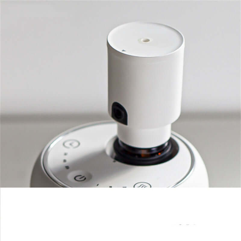 Handy Car Waterless Diffuser Desktop Humidifier top view showing the control buttons and essential oil compartment.