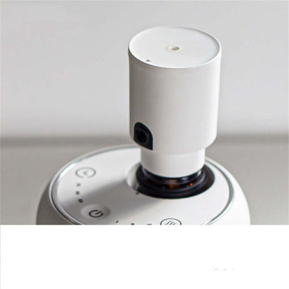 Handy Car Waterless Diffuser Desktop Humidifier top view showing the control buttons and essential oil compartment.