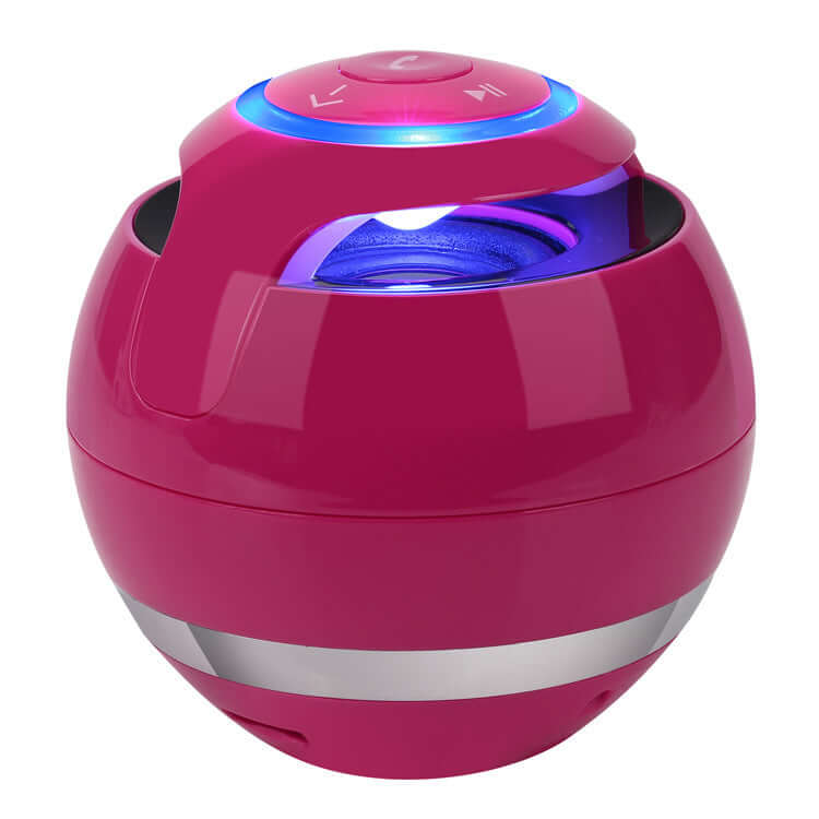 Wireless bluetooth speaker in stylish pink design with LED light and Bluetooth 5.0 connectivity.
