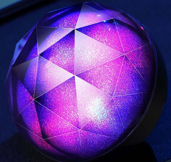 LED seven-color bluetooth speaker magic ball bluetooth speaker stylish design with vibrant purple and blue hues.