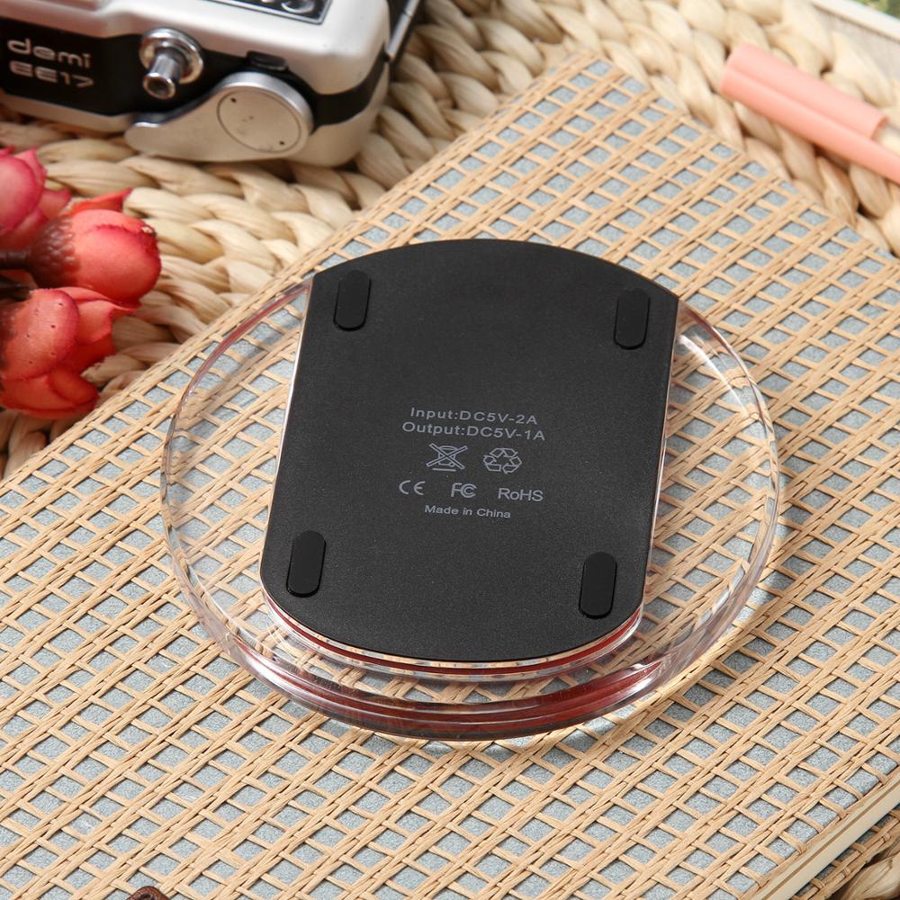 Wireless charger wireless receiver with transparent design, showing input and output specifications on the bottom.