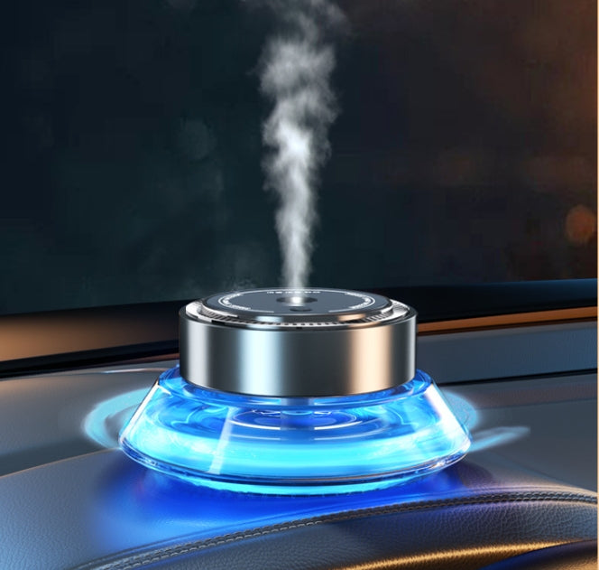 Smart Spray Car Mounted Fragrance Accessories emitting soothing mist and illuminated with blue light.