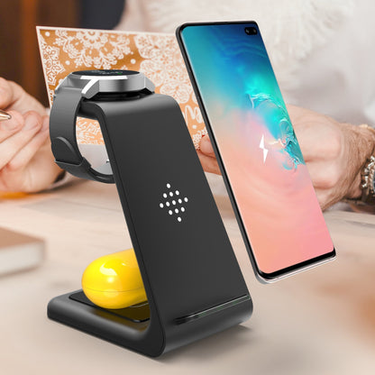 3 In 1 Fast Charging Station Wireless Charger Stand Wireless Quick Charge Dock For Phone Holder with phone and earbuds.