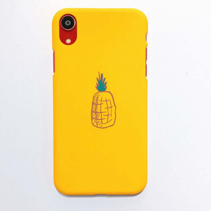 Funny pineapple design phone case in vibrant yellow for iPhone models, protecting from scratches and shocks.