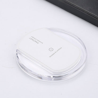Wireless charger wireless receiver on a sleek, clear surface, showcasing modern design and QI compliance.