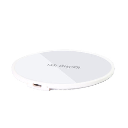 Earphone wireless charger designed in a circular shape with micro USB interface for efficient charging.