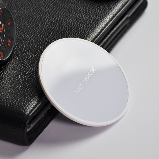 Earphone wireless charger on a black wallet, featuring a fast charge design with a sleek circular style.