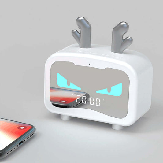 Wireless Bluetooth speaker with fun design featuring antenna-like horns and digital display.