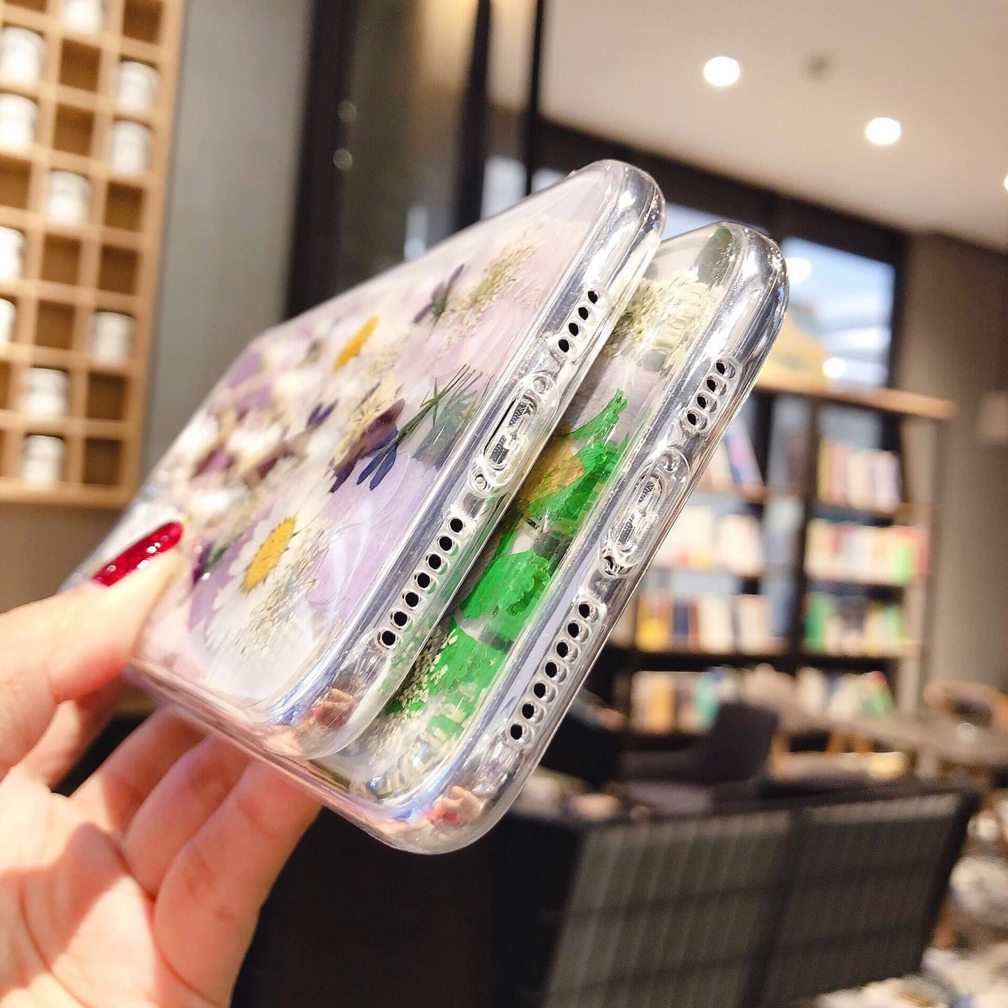 Preserved flower phone cases showcasing floral designs, stylish protection for iPhones, ideal for nature lovers.