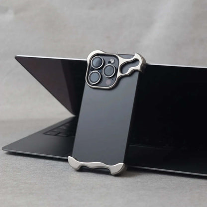 Zinc alloy iPhone 15 Pro Max case showcased on a laptop, offering stylish and durable protection.