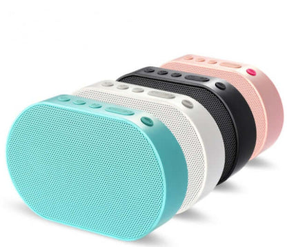 Bluetooth stereo smart speaker in four colors: blue, white, black, and pink, showcasing sleek design and controls.