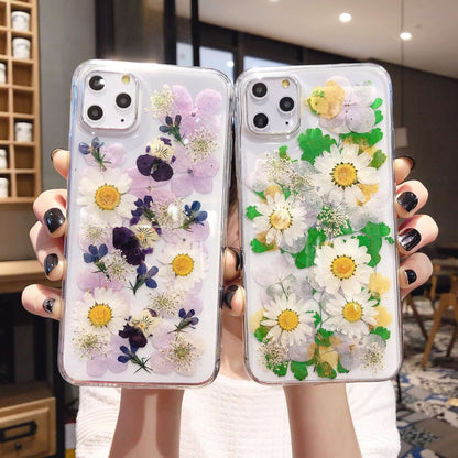 Preserved flower phone cases featuring vibrant floral designs for iPhone models, showcasing nature's beauty.
