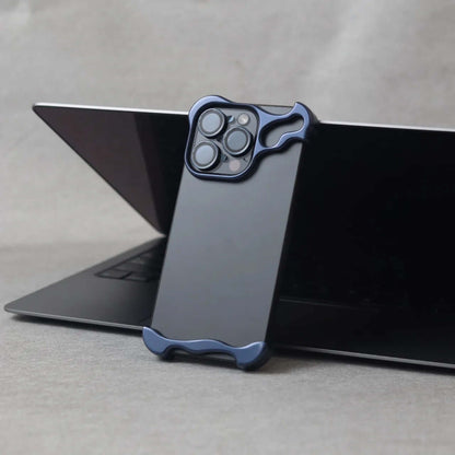 Zinc alloy iPhone 15 Pro Max case displayed on a laptop, showcasing its sleek design and premium protection.