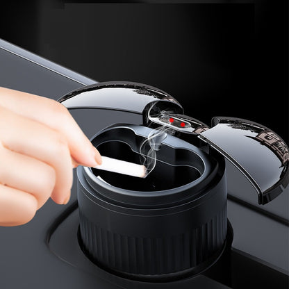 Multi-functional Creative Smart Car Ashtray With Lid in use, demonstrating USB charging and smoke elimination.