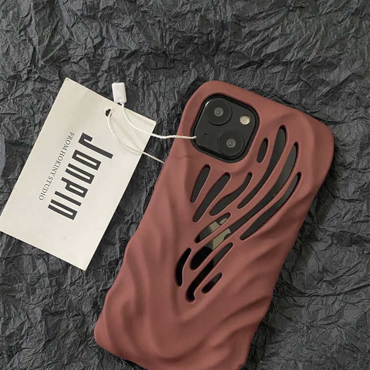 Titanium gray hollow iPhone case with wind hollowed-out design for stylish protection and better heat dissipation.
