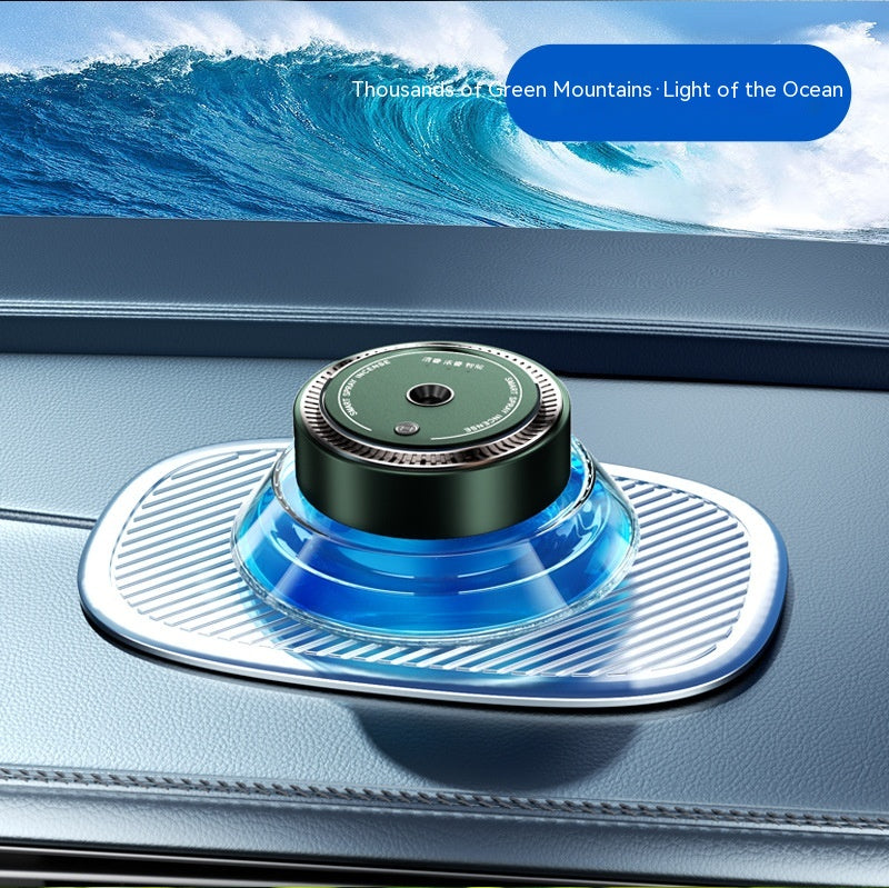 Smart Spray Car Mounted Fragrance Accessories on car dashboard with ocean wave background.